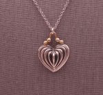 Lagos (947) 925 SS + 18K Heart "Caviar" Fluted Pendant with Chain