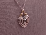 Lagos (947) 925 SS + 18K Heart "Caviar" Fluted Pendant with Chain